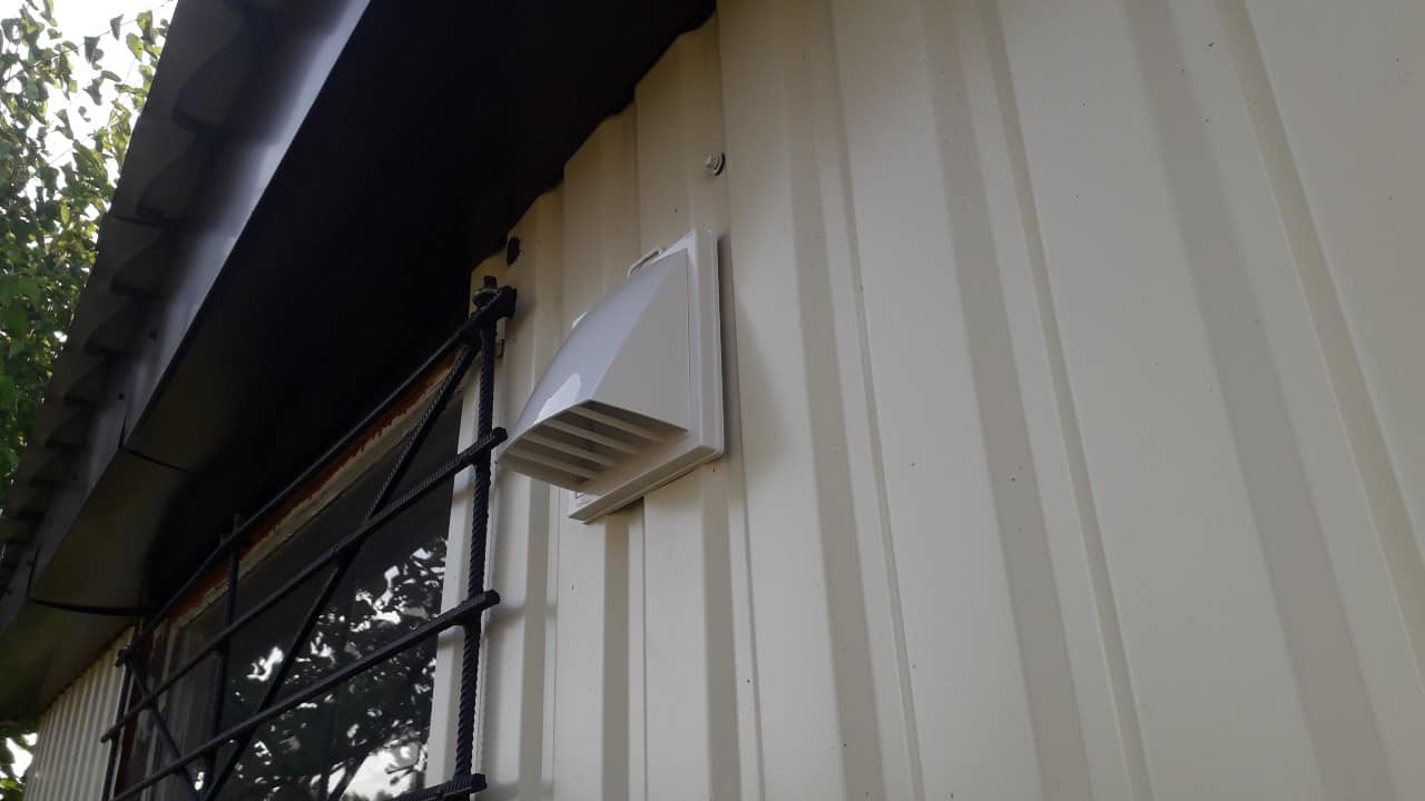 Bathroom vent on an exterior wall