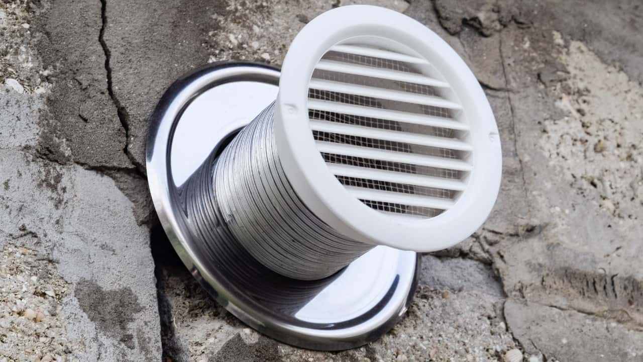 Bathroom vent in an exterior wall